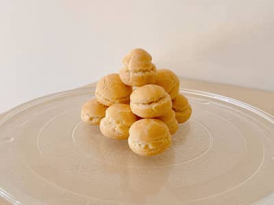 A croquembouche tower of caramel-bound choux puffs
