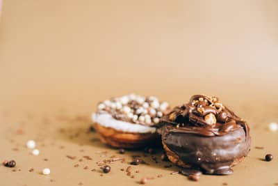 A cream-filled hybrid pastry showing laminated layers
