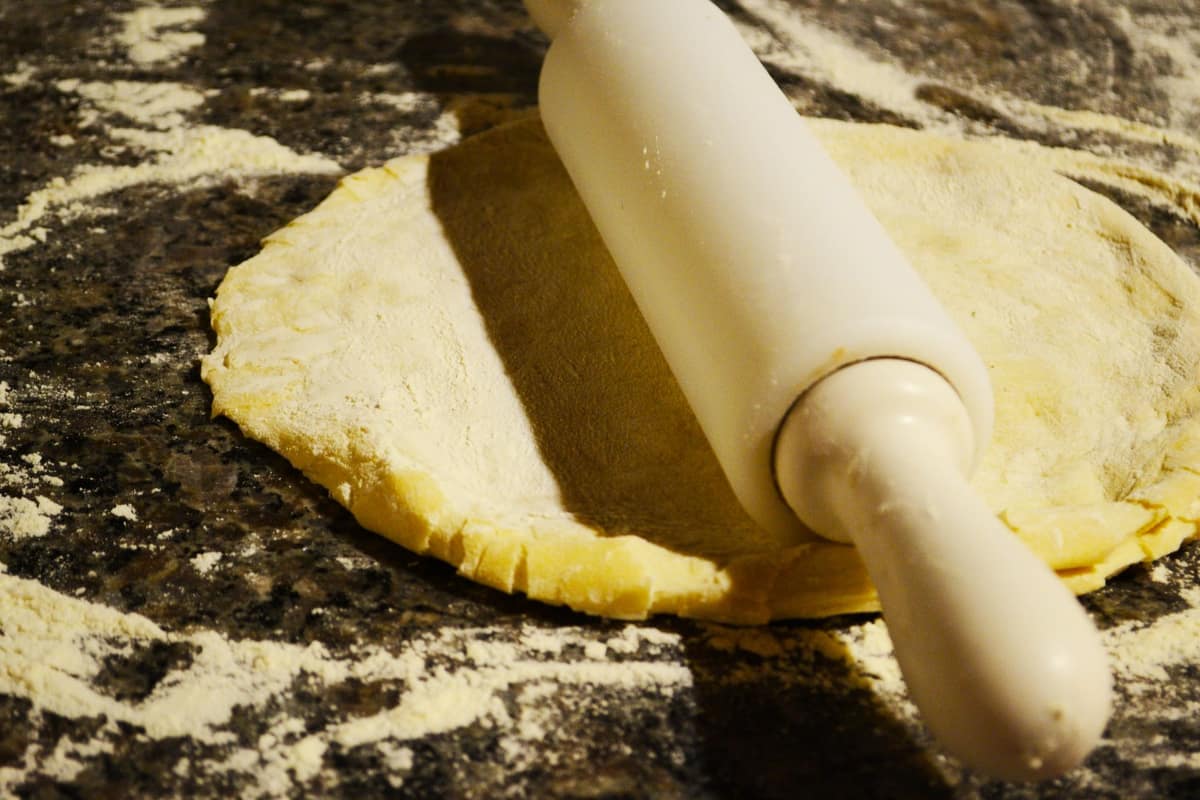 Rich sweet tart dough with a rolling pin